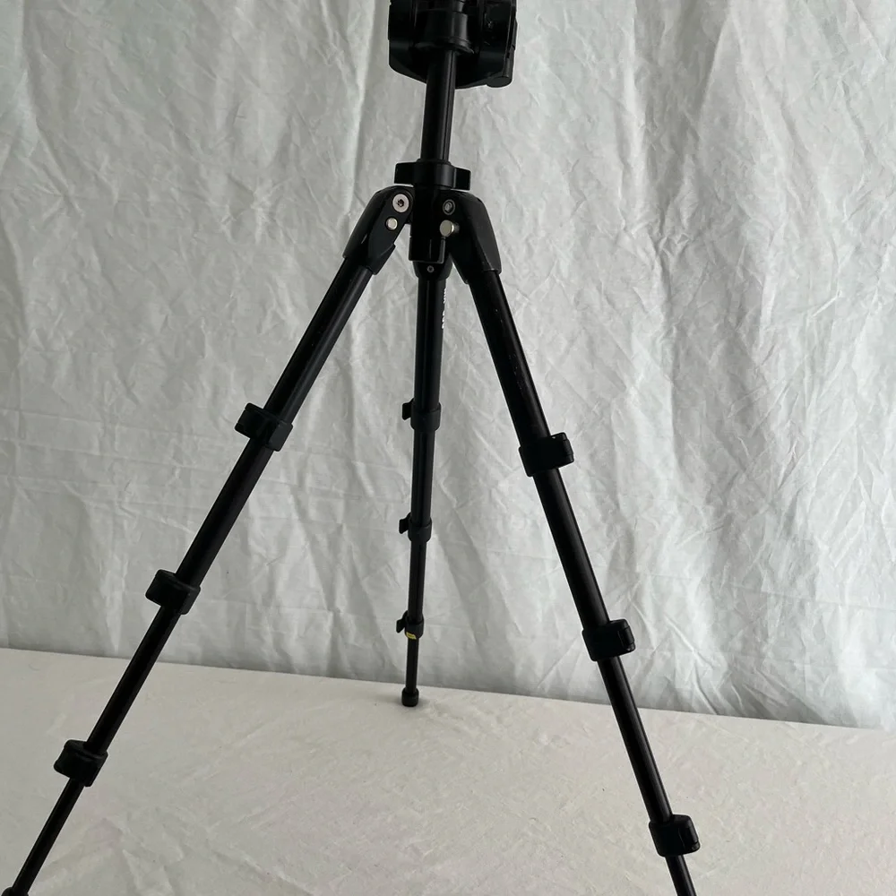 Black swivel head tripod